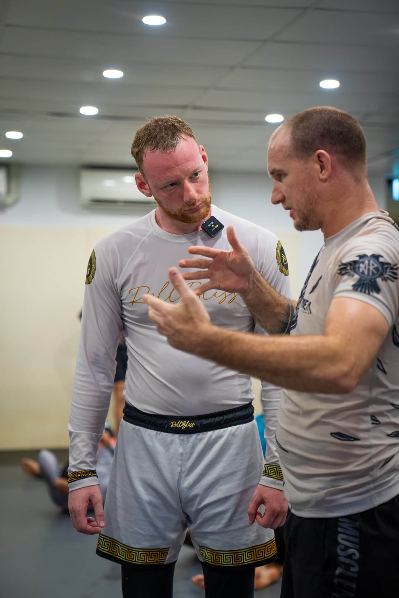 A Good Dose coach guiding a beginner through a technique
